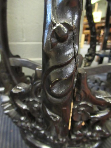 Lot 499 - Two marble inset Chinese hardwood urn stands,...