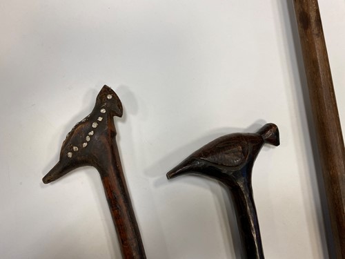 Lot 292 - Two Southern Nepal (Terai Province) wood palanquin rest poles, early 20th century