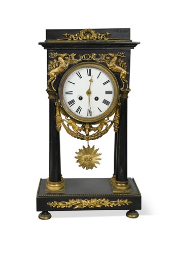 Lot 800 - An Empire style gilt metal mounted black marble mantle clock, late 19th century