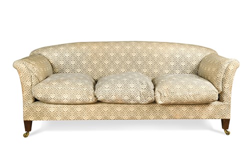 Lot 447 - A large three seater Howard & Sons sofa