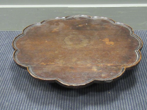 Lot 553 - An oak dumb-waiter 56cm wide