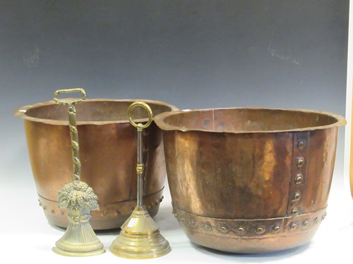 Lot 553 - Two copper log bins and two brass door stops