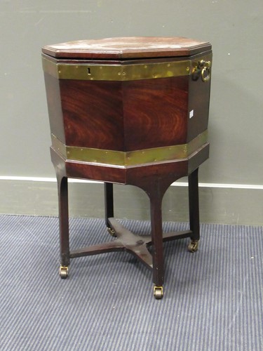 Lot 437 - A late George mahogany octagonal cellaret, on...
