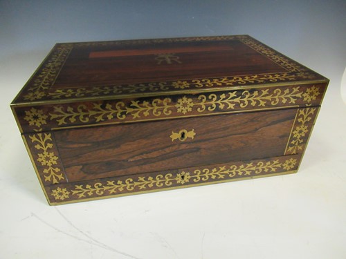 Lot 153 - A Regency rosewood and brass inlaid work box,...