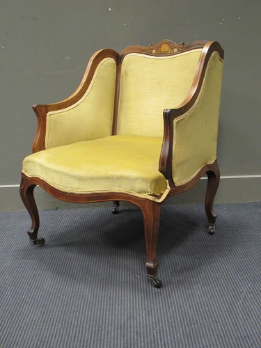 Lot 480 - An Edwardian rosewood tub armchair with...
