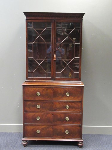 Lot 549 - A George III figured mahogany secretaire with...