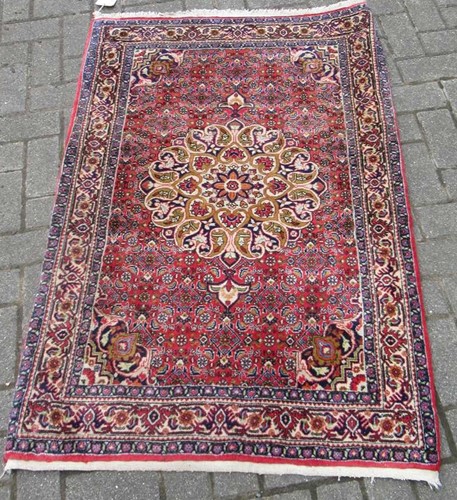Lot 600 - A Persian style rug, ivory and pink reserve,...
