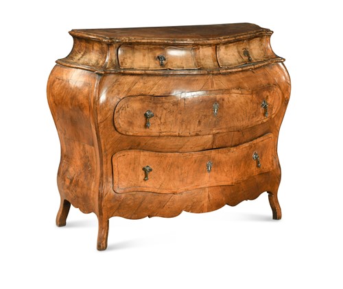 Lot 264 - A north Italian walnut bombé commode, 18th century