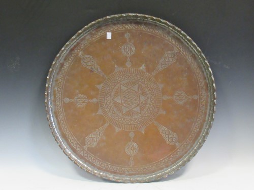 Lot 137 - Two Middle Eastern copper circular dishes