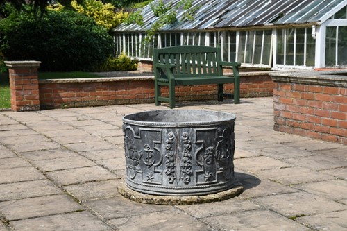 Lot 541 - A circular lead planter, 20th century