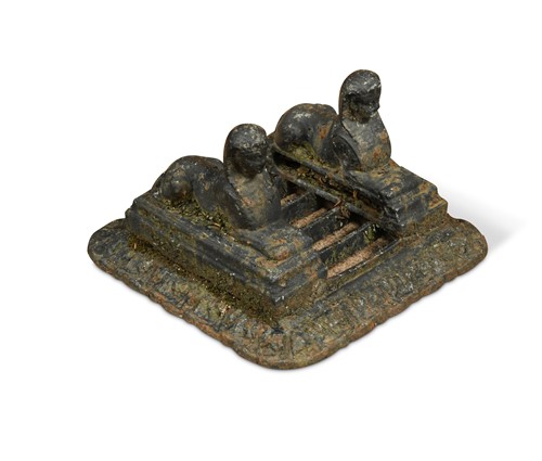 Lot 535 - A Regency black painted cast iron boot scraper