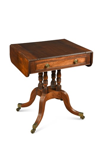 Lot 404 - A late Regency mahogany games table
