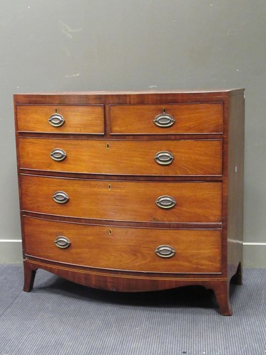 Lot 552 - A George III mahogany and cross banded chest...