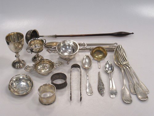 Lot 202 - A punch ladle, silver tea strainers and stand,...