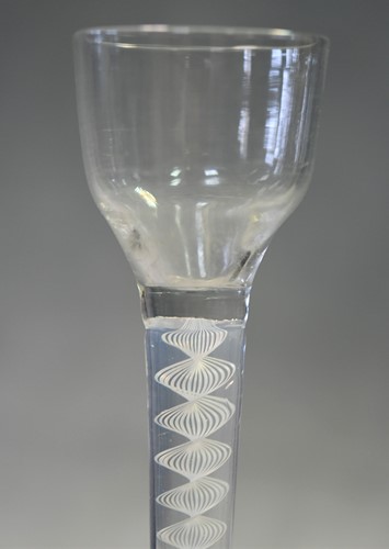 Lot 241 - Two 18th century air-twist wine glasses
