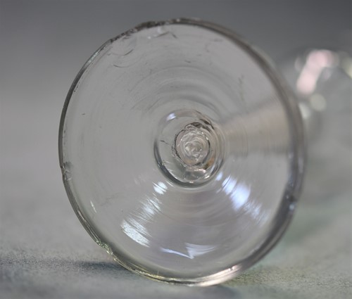 Lot 241 - Two 18th century air-twist wine glasses