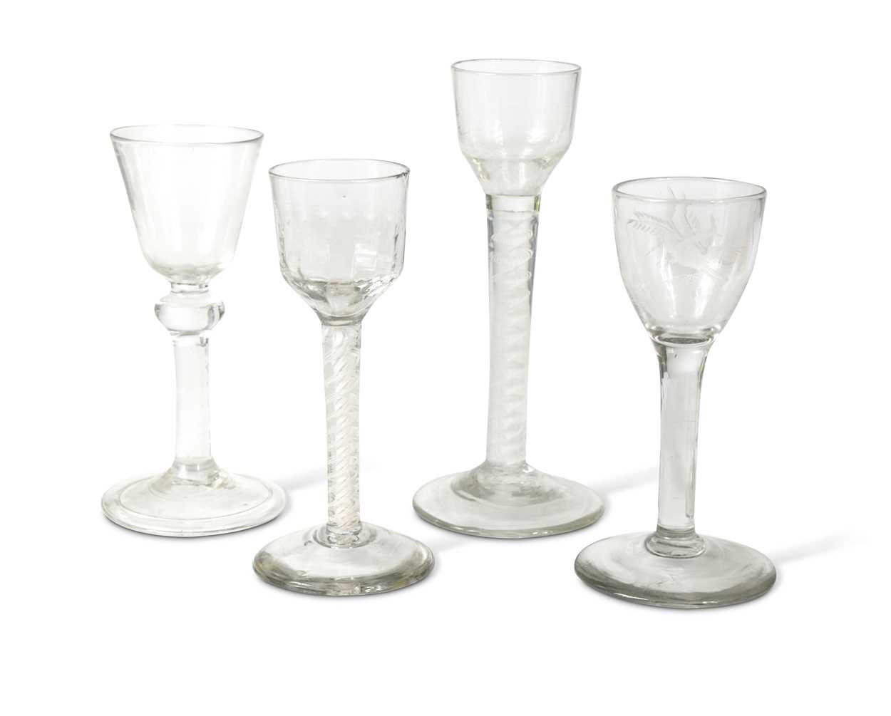 Lot 241 - Two 18th century air-twist wine glasses
