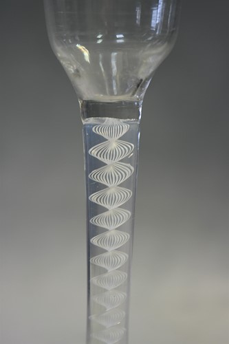 Lot 241 - Two 18th century air-twist wine glasses