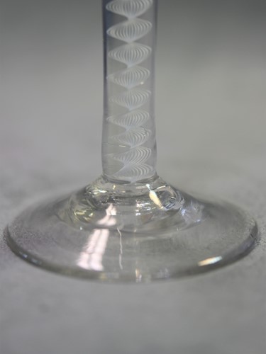 Lot 241 - Two 18th century air-twist wine glasses