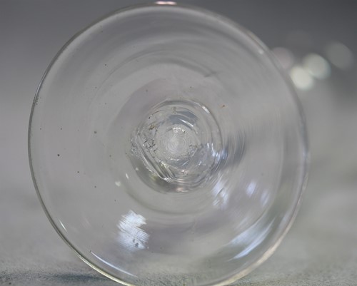 Lot 241 - Two 18th century air-twist wine glasses