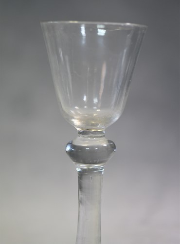 Lot 241 - Two 18th century air-twist wine glasses
