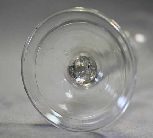 Lot 241 - Two 18th century air-twist wine glasses