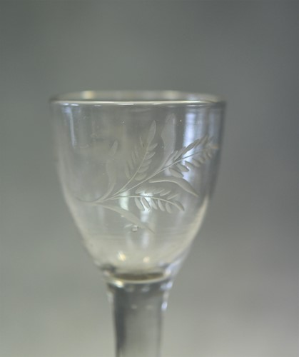 Lot 241 - Two 18th century air-twist wine glasses