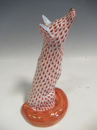 Lot 107 - A Herend red fishnet model of a fox