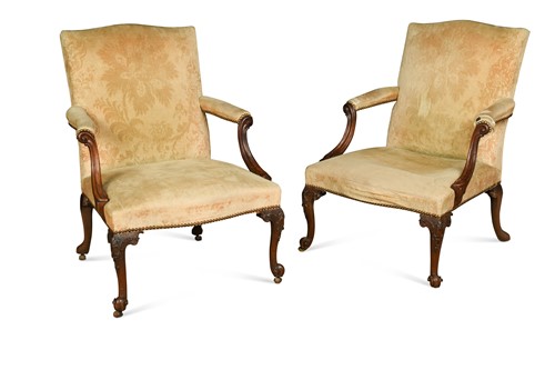 Lot 256 - A pair of early George III mahogany library open armchairs