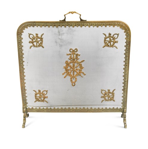 Lot 278 - A gilt metal mesh fire guard