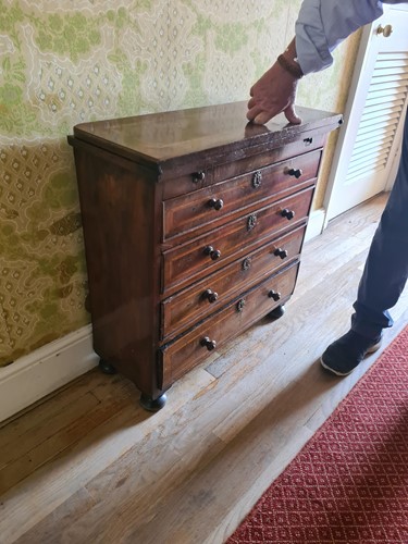 Lot 300 - A walnut bachelor’s chest, 18th century and later