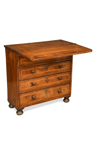 Lot 300 - A walnut bachelor’s chest, 18th century and later