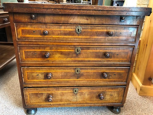 Lot 300 - A walnut bachelor’s chest, 18th century and later
