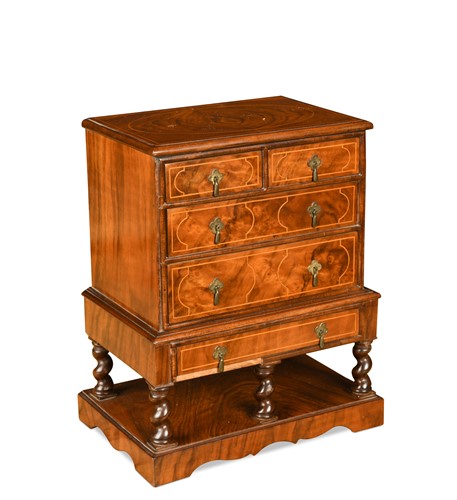 Lot 211 - A miniature walnut William & Mary style chest on stand, 20th century