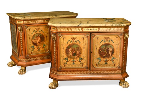 Lot 370 - A pair of painted and gilded satinwood cabinets, in the manner of Robert Adam, early 19th century