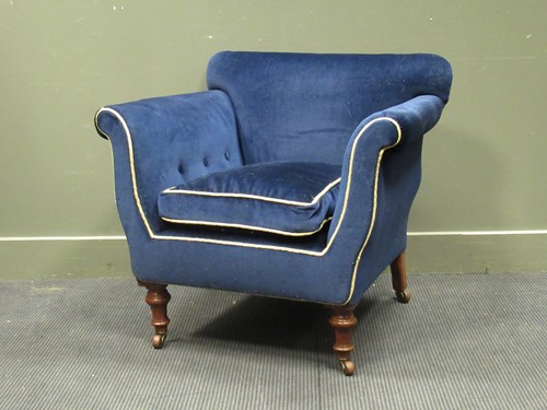 Lot 488 - A country house Victorian armchair with navy...