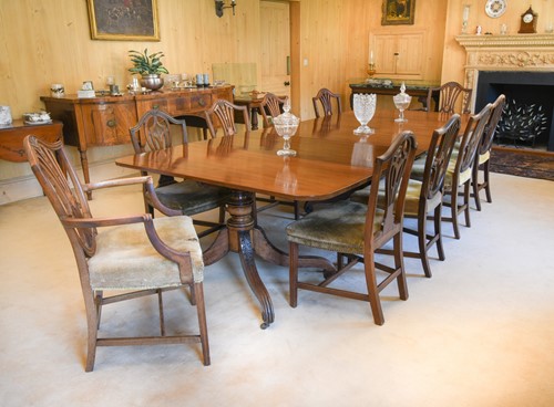 Lot 409 - A George IV mahogany three pillar dining table