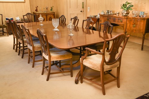 Lot 515 - A matched set of twelve mahogany dining chairs