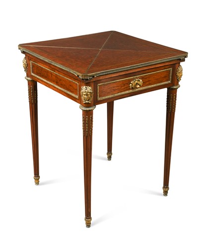 Lot 435 - A Louis XVI style acajou moucheté and gilt metal mounted card table, attributed to Henry Dasson