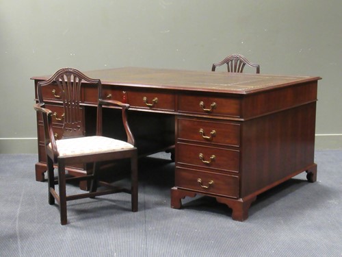 Lot 453 - A George III style twin pedestal desk partners...