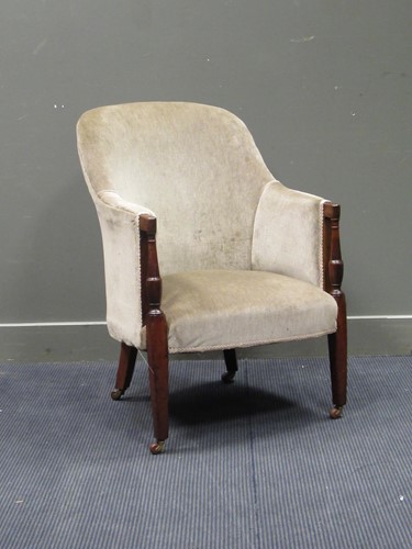 Lot 448 - A Regency mahogany armchair on later ceramic...