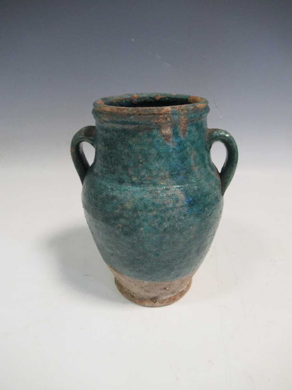 Lot 26 - A Kashan pottery two-handled vase, 17cm high