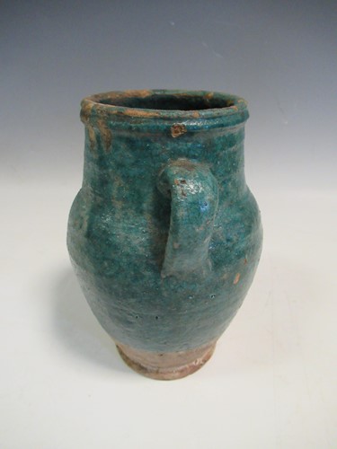 Lot 26 - A Kashan pottery two-handled vase, 17cm high