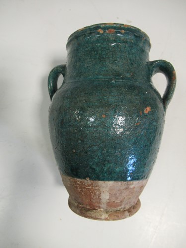 Lot 26 - A Kashan pottery two-handled vase, 17cm high