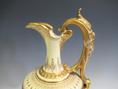 Lot 17 - A Coalport ewer, 36cm high