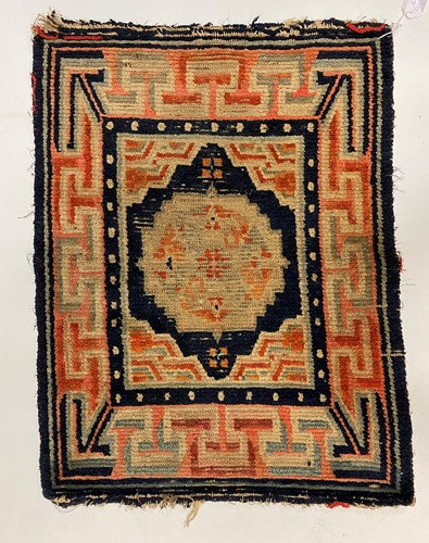 Lot 276 - A Tibetan pillow rug, late 19th century