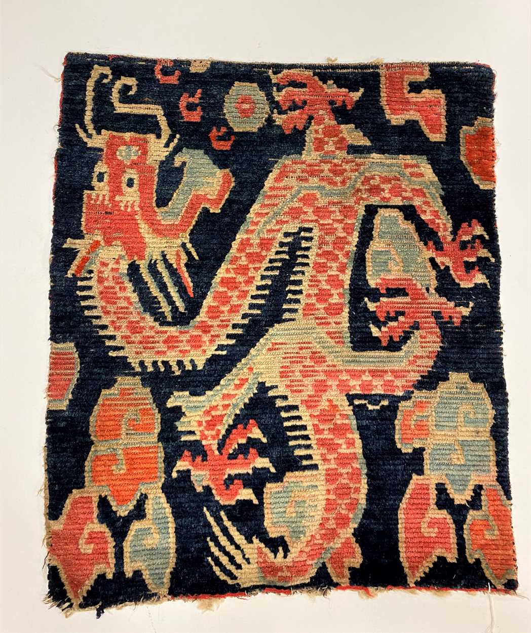 Lot 282 - A Tibetan Gomden pillow rug, late 19th century
