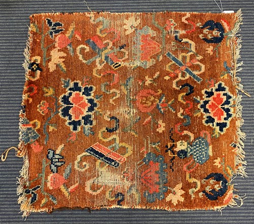 Lot 216 - A Tibetan Gomden pillow rug, late 19th century