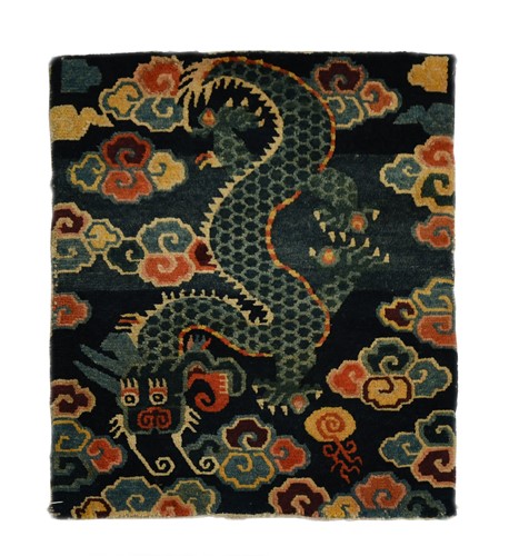 Lot 169 - A Tibetan Gomden pillow rug, 20th century