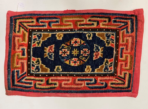 Lot 333 - A Tibetan Gomden pillow rug, late 19th century/early 20th century